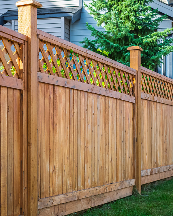 Newly installed wood panel fence in Berkshire